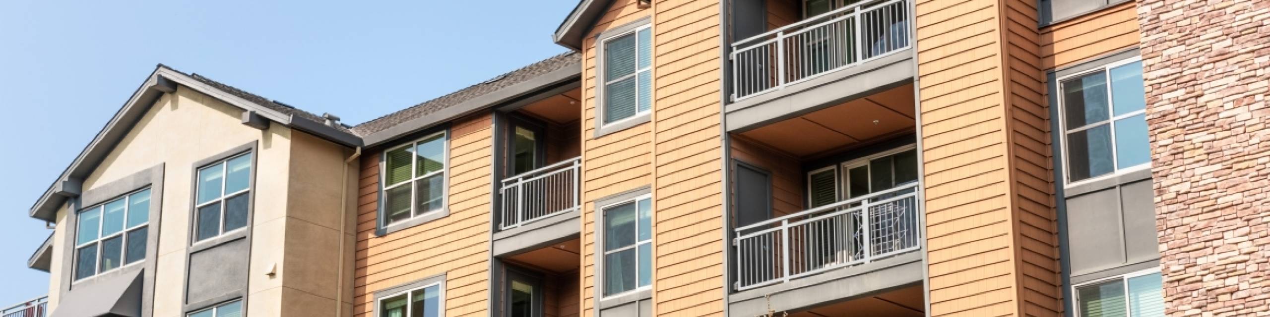 A van sitting on a neighborhood street
